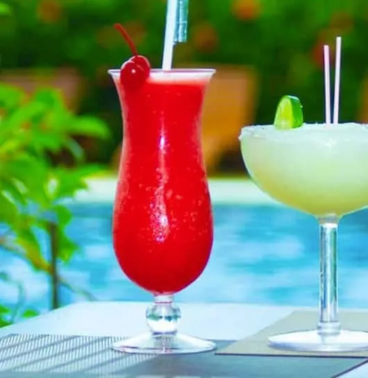 Two cocktails by the pool